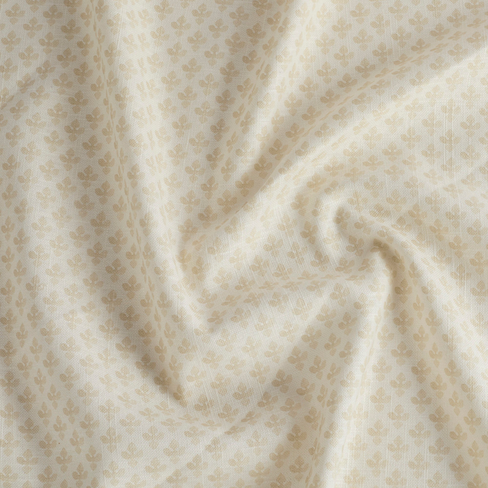 Lyra Parchment high-quality drapery fabric by Tonic Living — warm white and beige floral block print on soft neutral linen-blend material.
