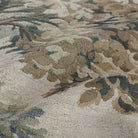 Close-up of Tonic Living Manor Tapestry Moss British-style upholstery fabric with leafy trees.