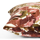 Side view of Tonic Living Marbella Rose decorative cushion highlighting its painterly burgundy and pink floral pattern.