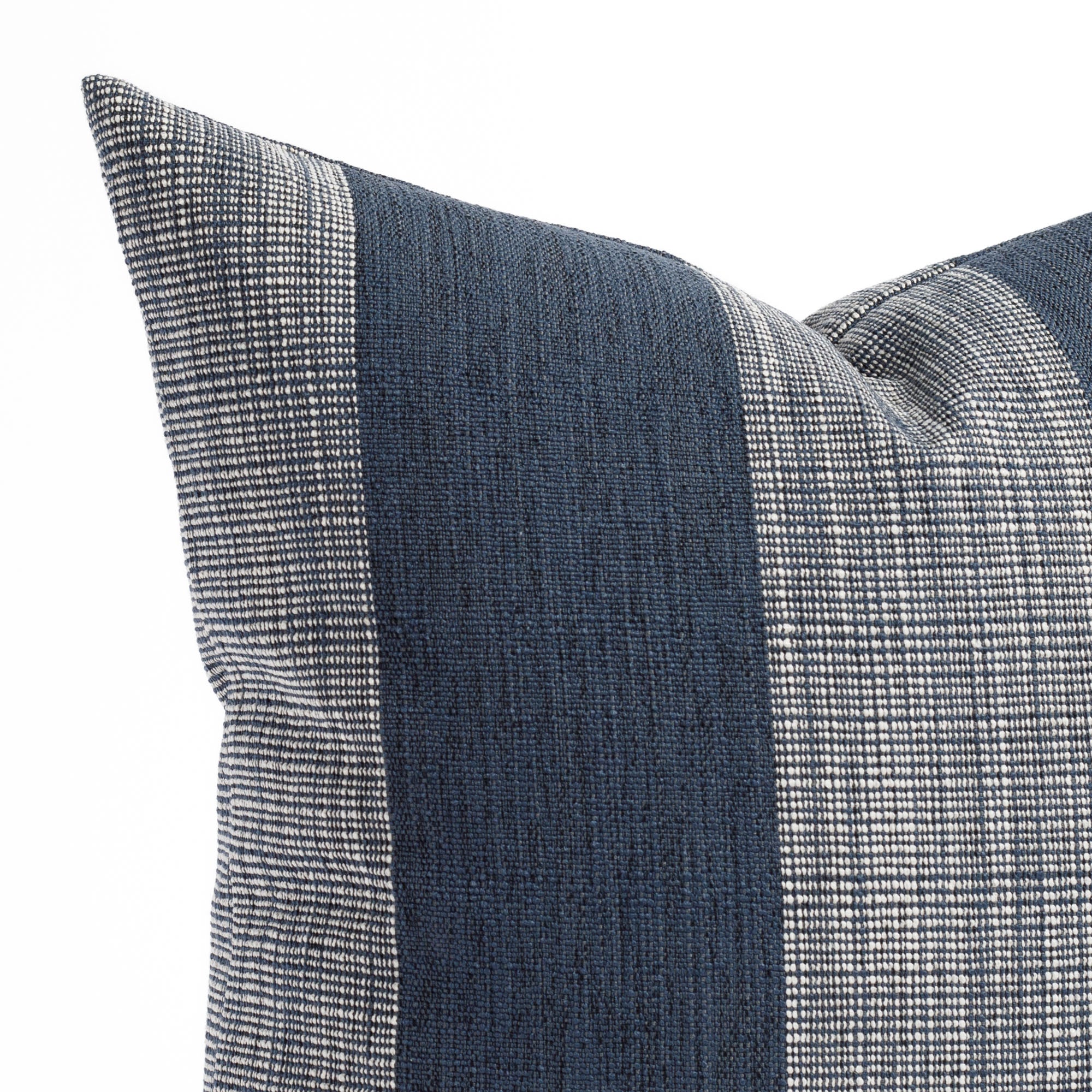an indigo blue and white vertical wide striped pillow : close up view