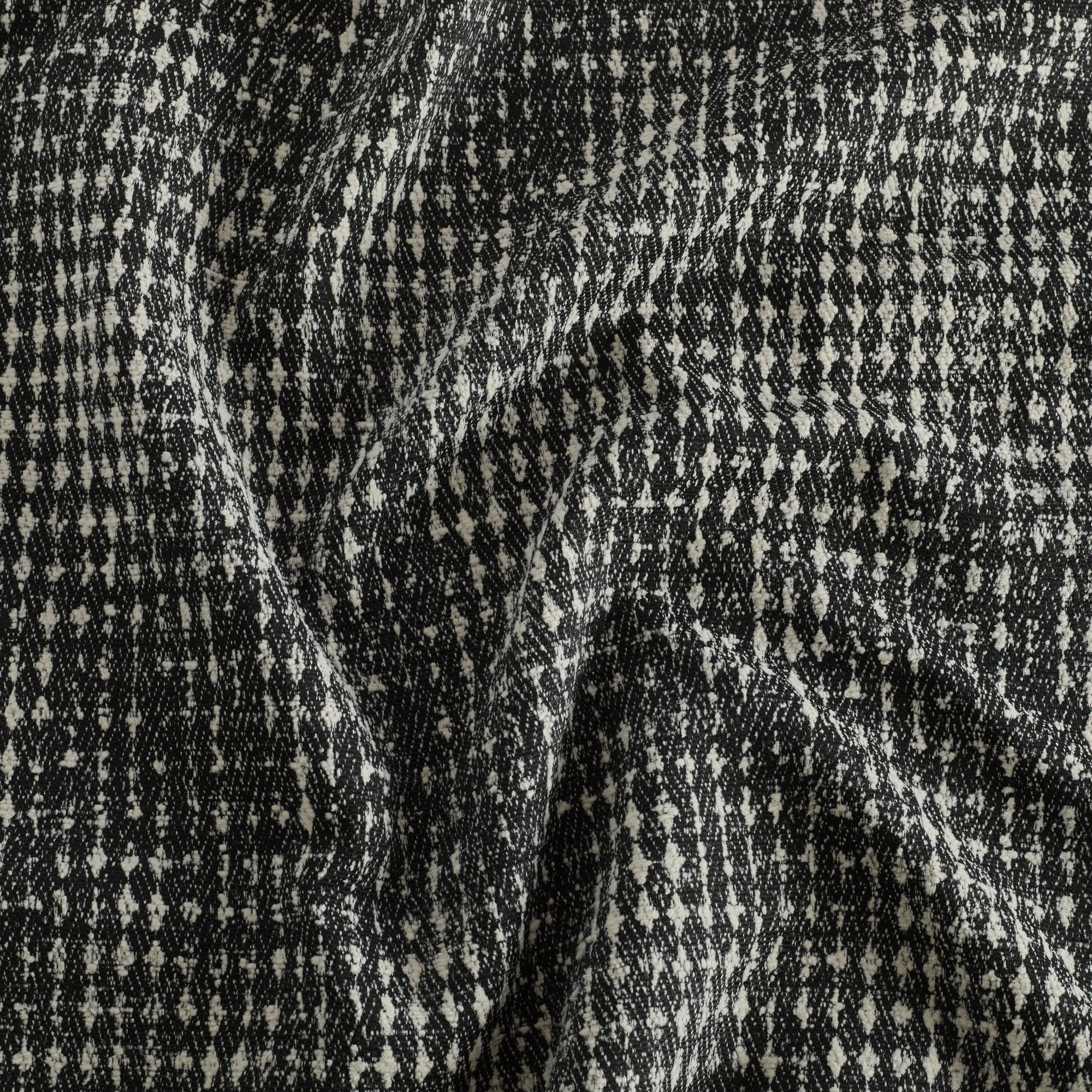 Otto Domino home decor fabric by Tonic Living — black and white abstract geometric design with a modern edge.