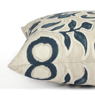 Side view of Tonic Living Paloma Ink toss cushion highlighting its stylized dark blue floral pattern and soft neutral palette.
