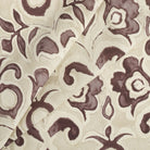 Tonic Living Paloma Fabric in Mauve, a smoky plum and oatmeal floral curtain fabric with a large-scale painterly botanical design.