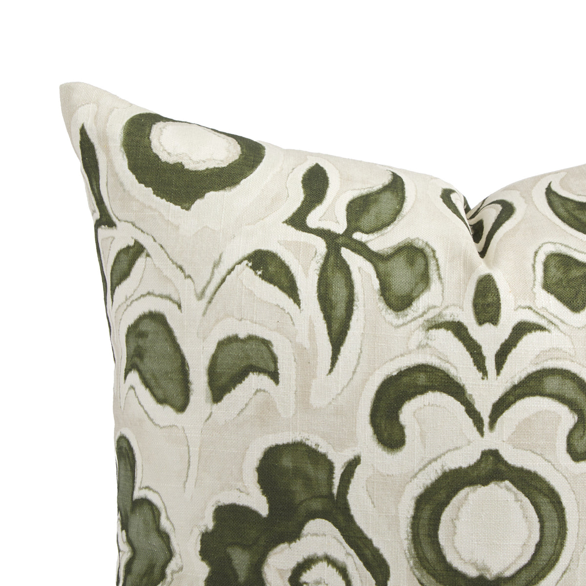 Close up of Tonic Living Paloma Olive pillow showing painterly olive green flowers and scrolling leaves on oatmeal beige.