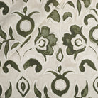 Tonic Living Paloma Fabric in Olive, an olive green floral drapery fabric with bold blooms and scrolling leaves on an oatmeal beige ground.