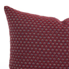 Close up of Pembrook 14x20 lumbar pillow, burgundy red with intricate diamond design, Tonic Living.