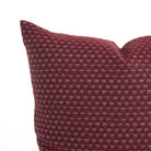 Close up of Pembrook 20x20 toss pillow, burgundy red diamond motif with woven detail from Tonic Living.