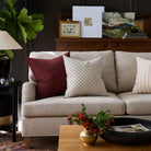 Living room with Pierce Navy blue and Bedford Merlot burgundy pillows styled on a sofa – Tonic Living