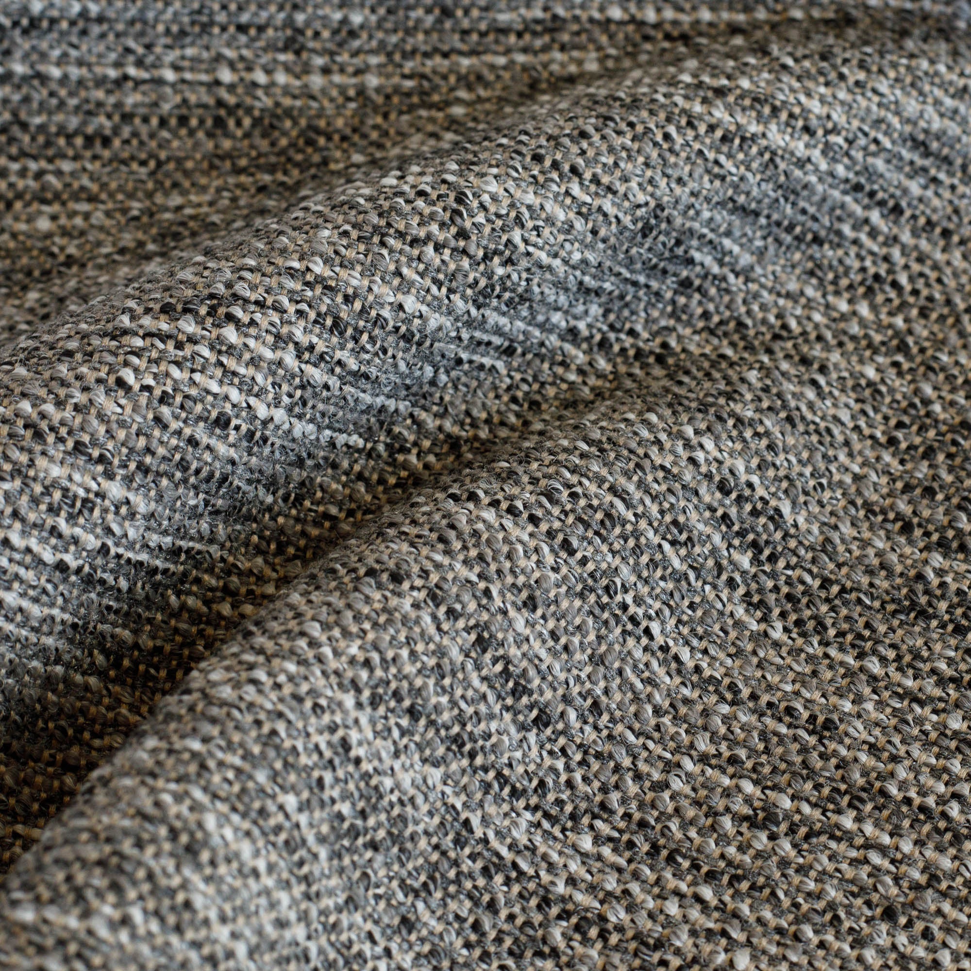 a charcoal and dark brown high performance upholstery fabric : close up view