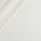 Tonic Living Positano Linen fabric in Oyster featuring a warm white 100% linen with natural texture.