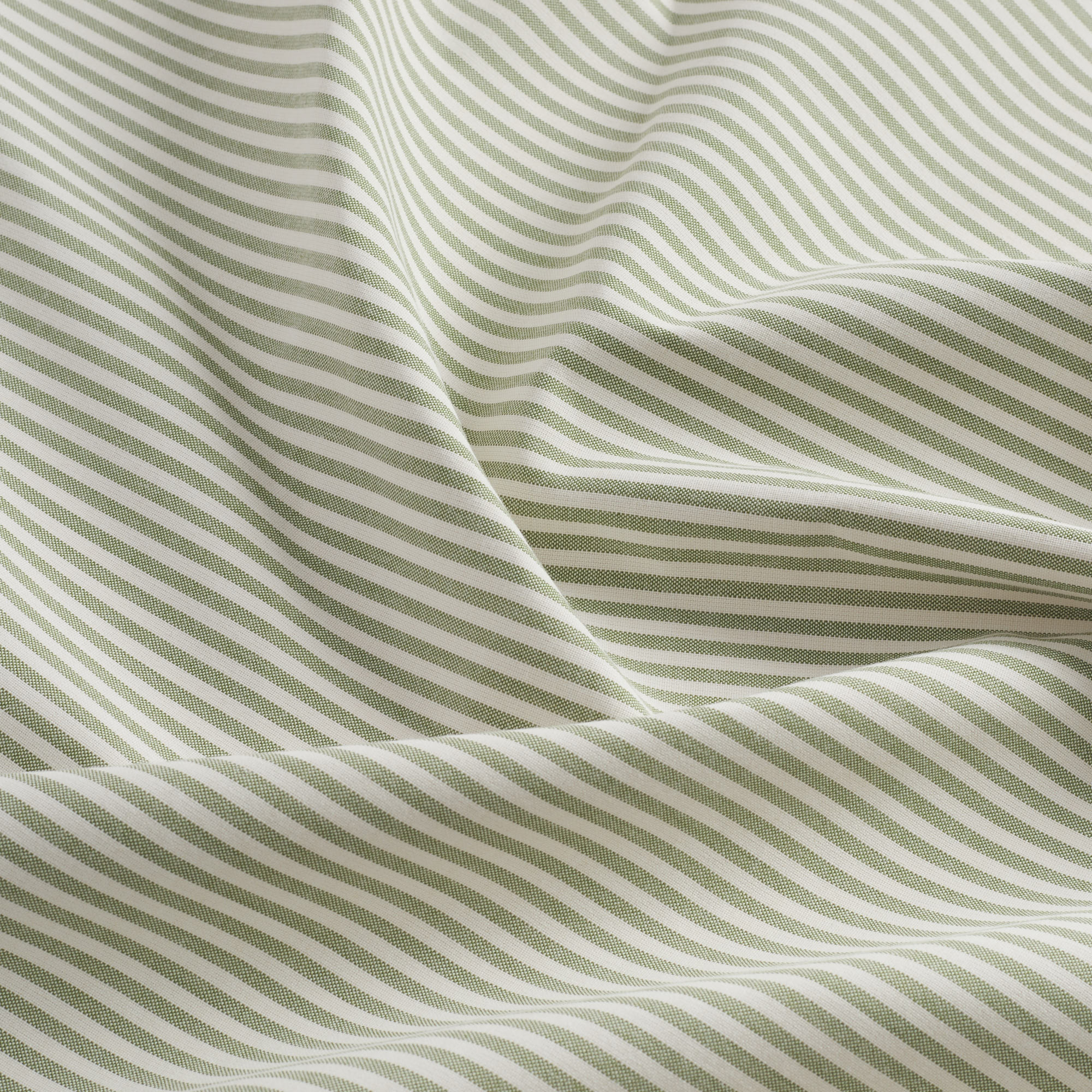 Tonic Living Refresh Sunbrella Hedge outdoor upholstery fabric with a clean green and white stripe design.