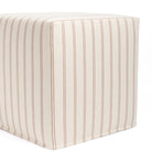 Corner angle view of Tonic Living Rexton Stripe Merlot ottoman — upholstered cube in burgundy and oatmeal fabric.