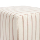 Detail view of Tonic Living Rexton Stripe Merlot accent ottoman in wine red and beige fabric, durable upholstery finish.