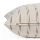 Zipper detail of Tonic Living Rexton Stripe Merlot 20x20 sofa pillow in burgundy and beige stripe design.