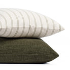 Stacked pillows: Tonic Living Rexton Stripe Moss 20x20 and Bedford 22x22 Moss decorative pillows in green tones.