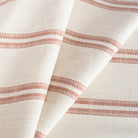 a beige and clay red striped indoor outdoor fabric
