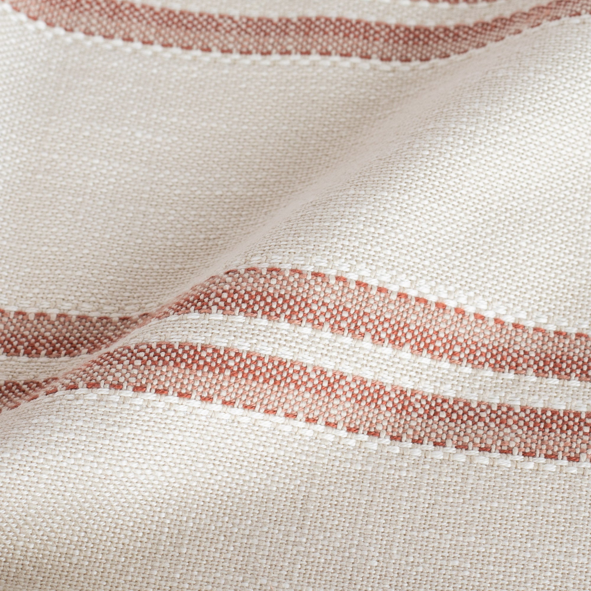 a sandy taupe and clay red striped indoor outdoor Inside Out fabric : close up view