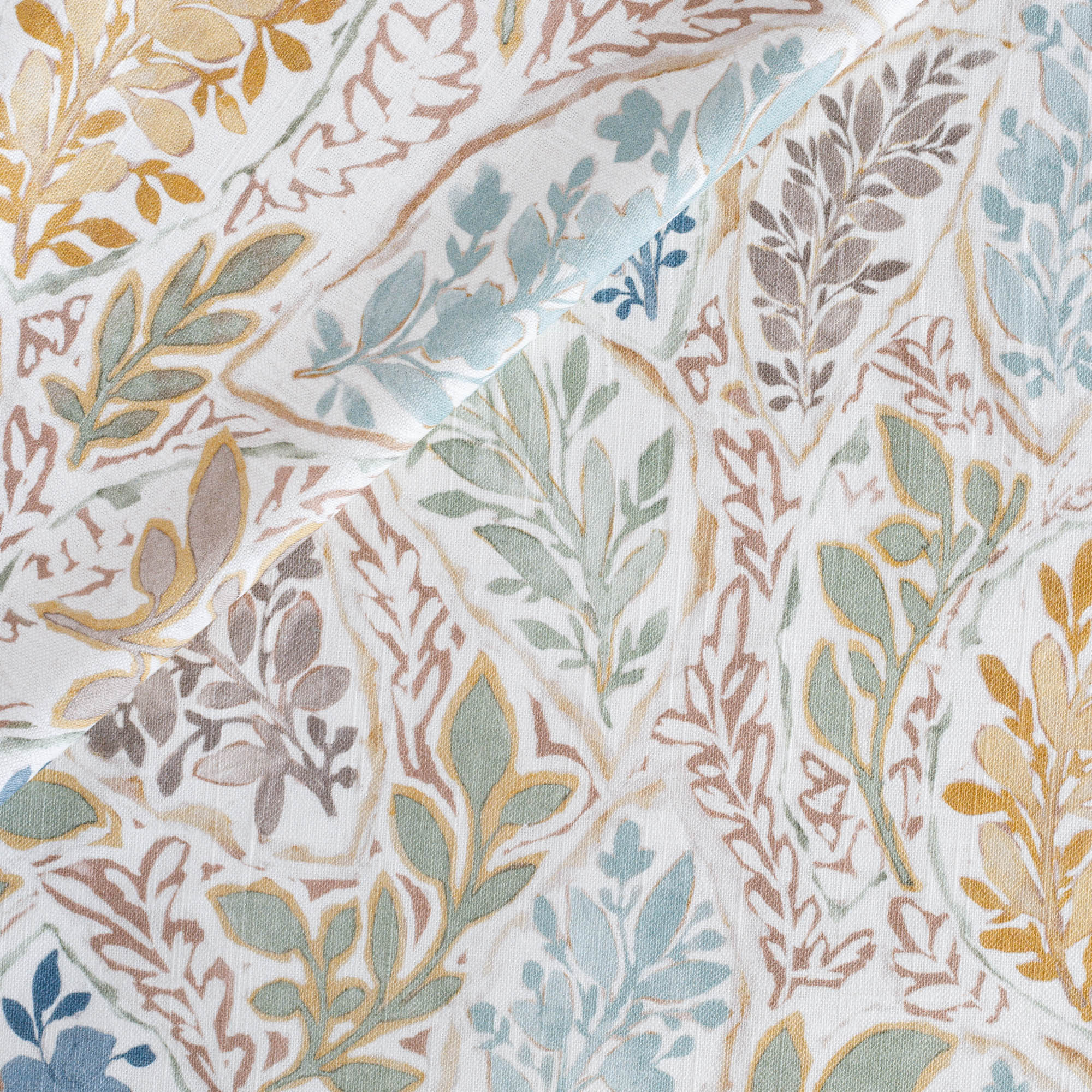 Rumi Fabric Harvest, an aqua, sage, marigold, mauve and stone blue watery floral print drapery fabric from Tonic Living