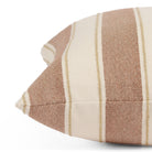 Side view of Tonic Living Sentiment Terracotta decorative cushion highlighting its bold striped design.