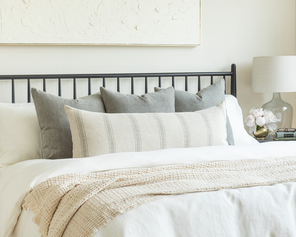 Watery Blue Bed Pillow Pairing: grey blue pillows with a farmhouse striped bed bolster pillow