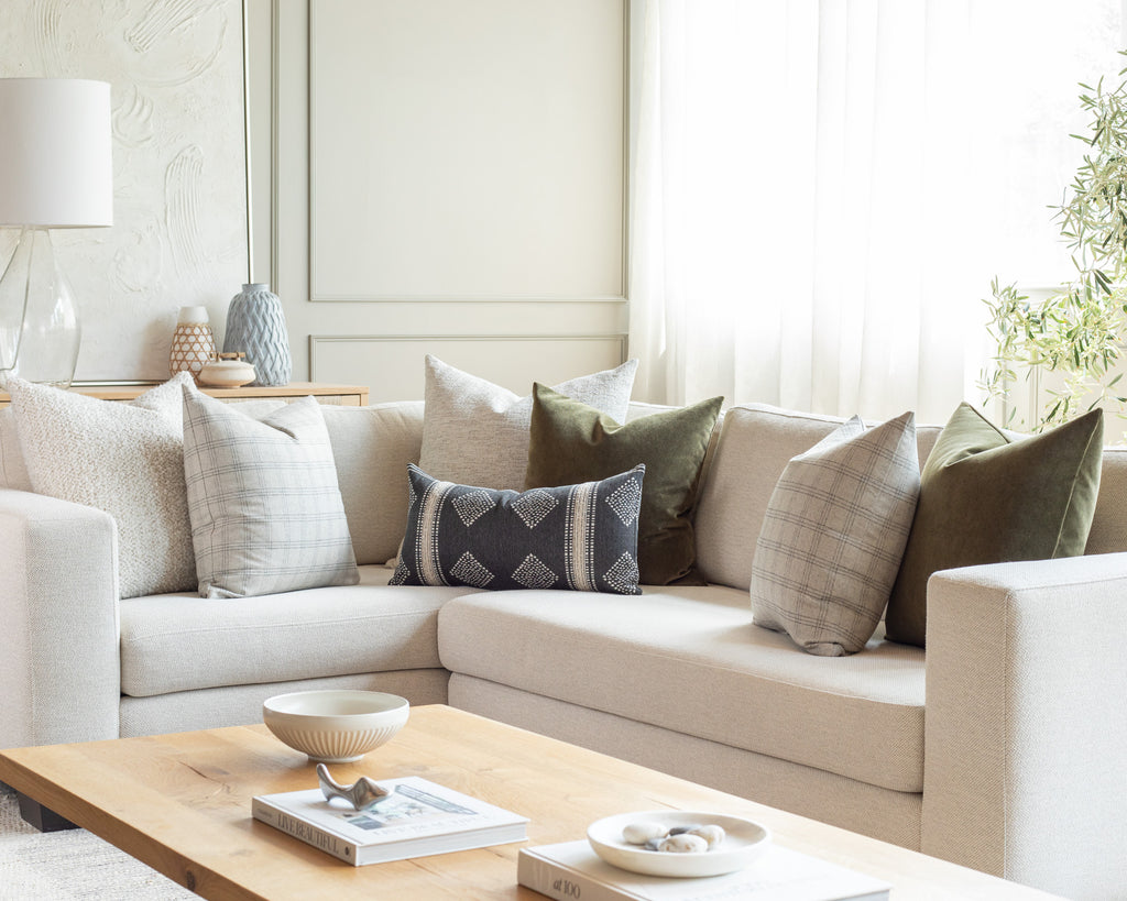rich moss and cream sectional throw pillow pairing
