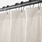 Tonic Living Siena Stripe Linen Shower Curtain in Buff, a warm ivory and beige shower curtain with soft vertical stripe.