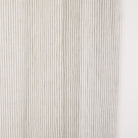Close up of Tonic Living Siena Stripe Linen Shower Curtain showing subtle vertical stripe in warm neutral tones.