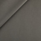 Tonic Living Smythe Faux Leather Fabric in Charcoal, a deep charcoal high-performance upholstery fabric with a natural leather look.