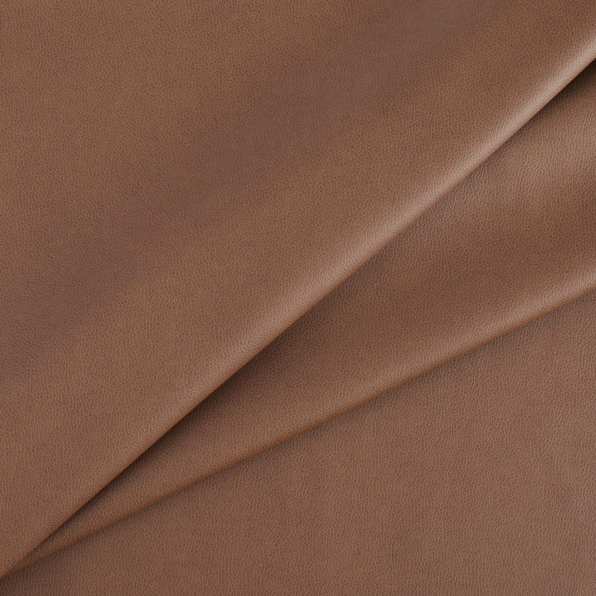 Tonic Living Smythe Cognac high-performance faux leather fabric featuring a rich brown colour and natural-looking grain.