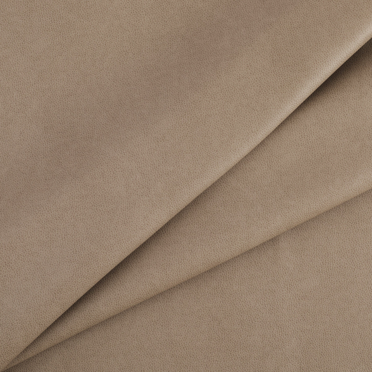 Tonic Living Smythe Portobello high-performance faux leather fabric featuring a warm taupe brown colour and natural-looking grain.