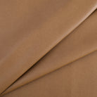 Tonic Living Smythe Saddle high-performance faux leather fabric featuring a warm brown colour and natural-looking grain.
