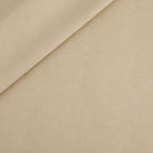 Tonic Living Smythe Faux Leather Fabric in Sandstone, a sandy beige high-performance upholstery fabric with a natural leather look.