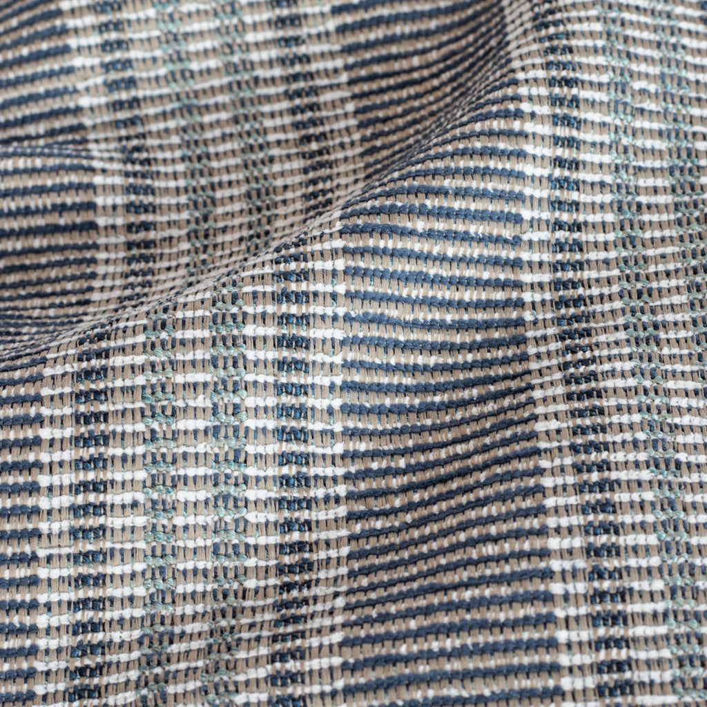 an indigo, aqua and sand striped upholstery fabric : close up view