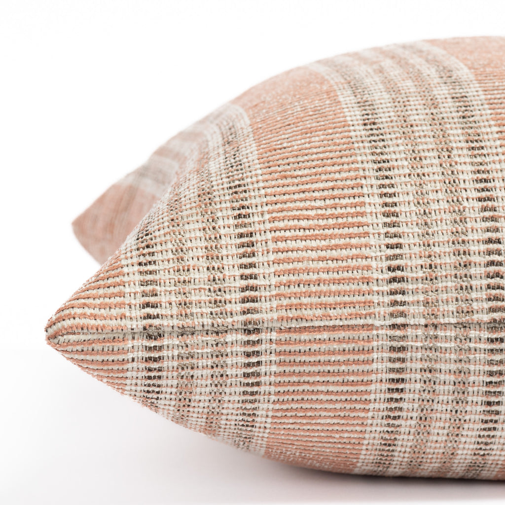an earthy  terracotta pink, brown and sand stripe outdoor pillow : close up zipper view