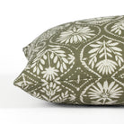 Side view of Tonic Living Stella Evergreen bed bolster highlighting its floral block print medallion pattern.