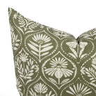 Close up of Tonic Living Stella Evergreen cushion showing dark olive green, beige, and natural floral medallion detail.