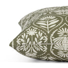 Side zipper detail of Tonic Living Stella 20x20 throw pillow in dark olive green and natural floral print.