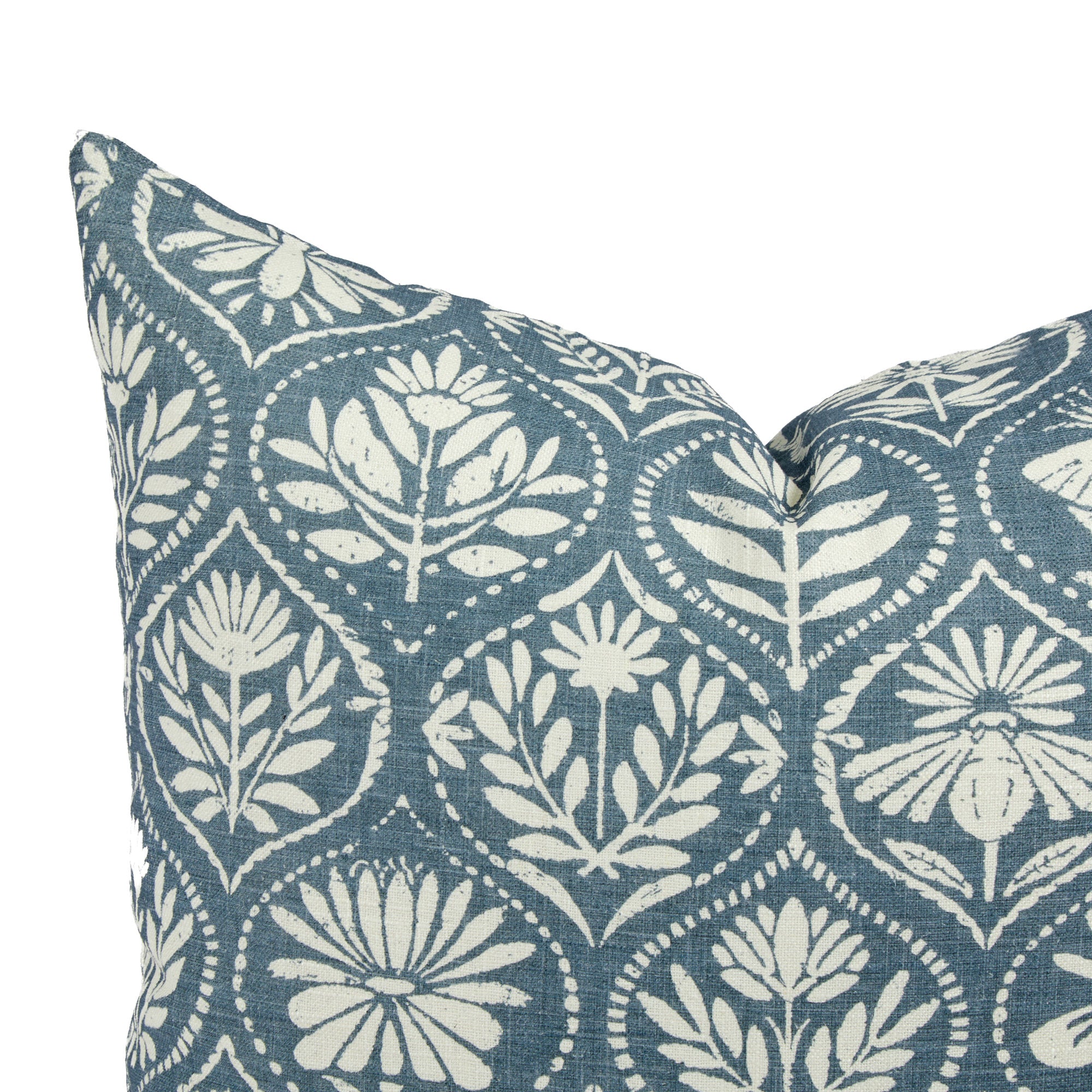 Close up of Tonic Living Stella Harbour Blue cushion showing slate blue, beige, and natural floral medallion detail.