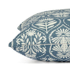Side zipper detail of Tonic Living Stella 20x20 throw pillow in blue and natural floral print.