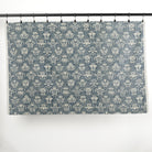 Full yard of Tonic Living Stella Harbour Blue drapery fabric showing blue and beige medallion pattern.
