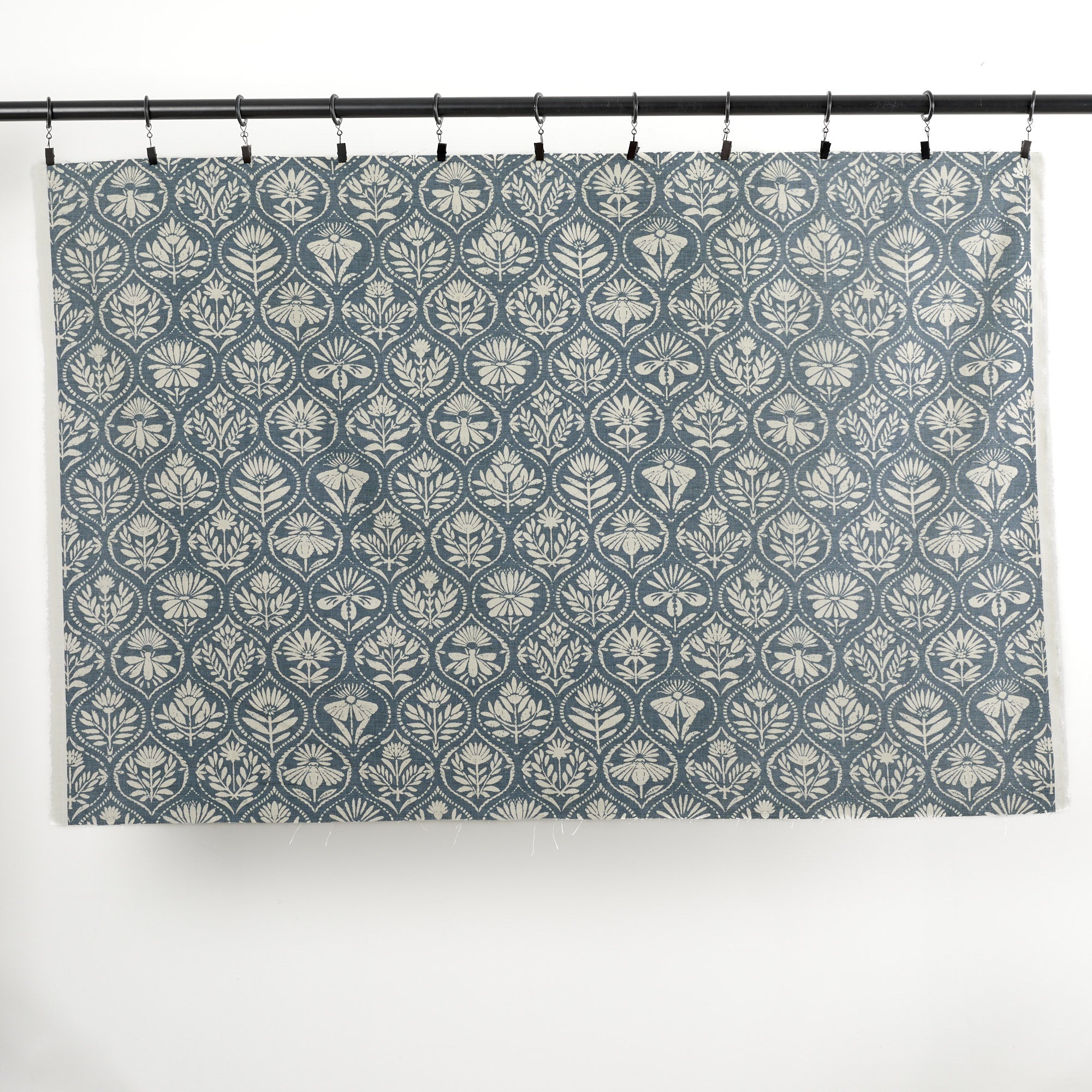 Full yard of Tonic Living Stella Harbour Blue drapery fabric showing blue and beige medallion pattern.