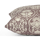Side zipper detail of Tonic Living Stella 20x20 throw pillow in mauve and natural floral print.