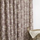 Tonic Living Stella Mauve curtain fabric shown as drapery in mauve and natural block print design.
