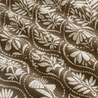 Tonic Living Stella Mocha drapery fabric shown with movement highlighting mocha brown and natural medallion pattern.