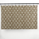 Full yard of Tonic Living Stella Mocha drapery fabric showing brown and beige medallion pattern.