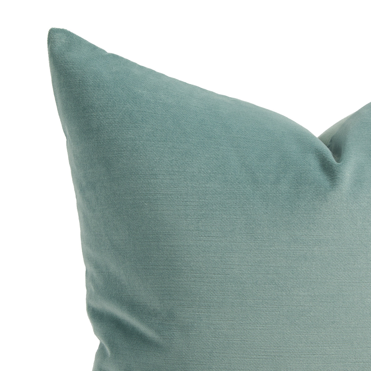 Close up of Tonic Living Sterling Velvet Lake pillow showing soft turquoise velvet with fine linear texture and luminous sheen.