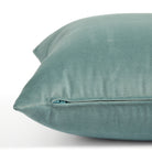 Side zipper detail of Tonic Living Sterling Velvet 20x20 pillow in soft aqua blue velvet.