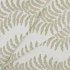 Tonic Living Swoon Sunbrella Sage indoor/outdoor upholstery fabric featuring a subtle botanical stripe in soft green tones.
