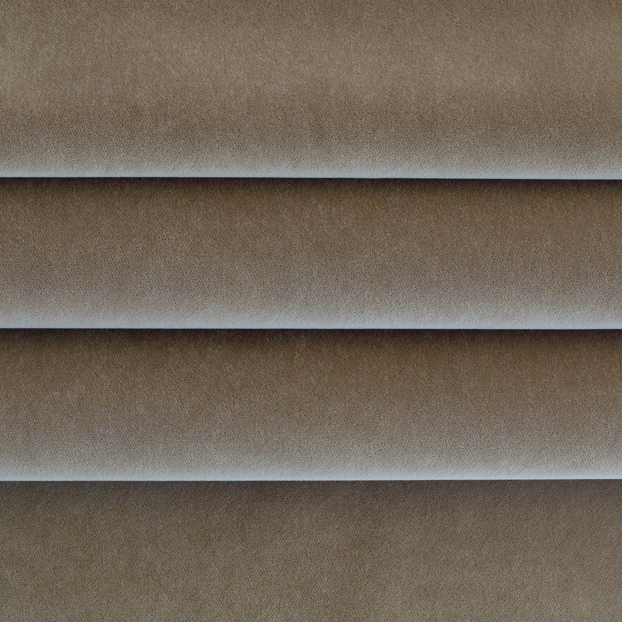 a mid toned brown velvet upholstery fabric