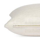 Side zipper detail of Tonic Living Webster 20x20 throw pillow in cream and greige checkerboard fabric.